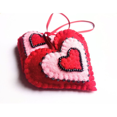 Heart with beads on a ribbon