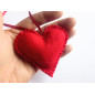 Heart in red ribbon